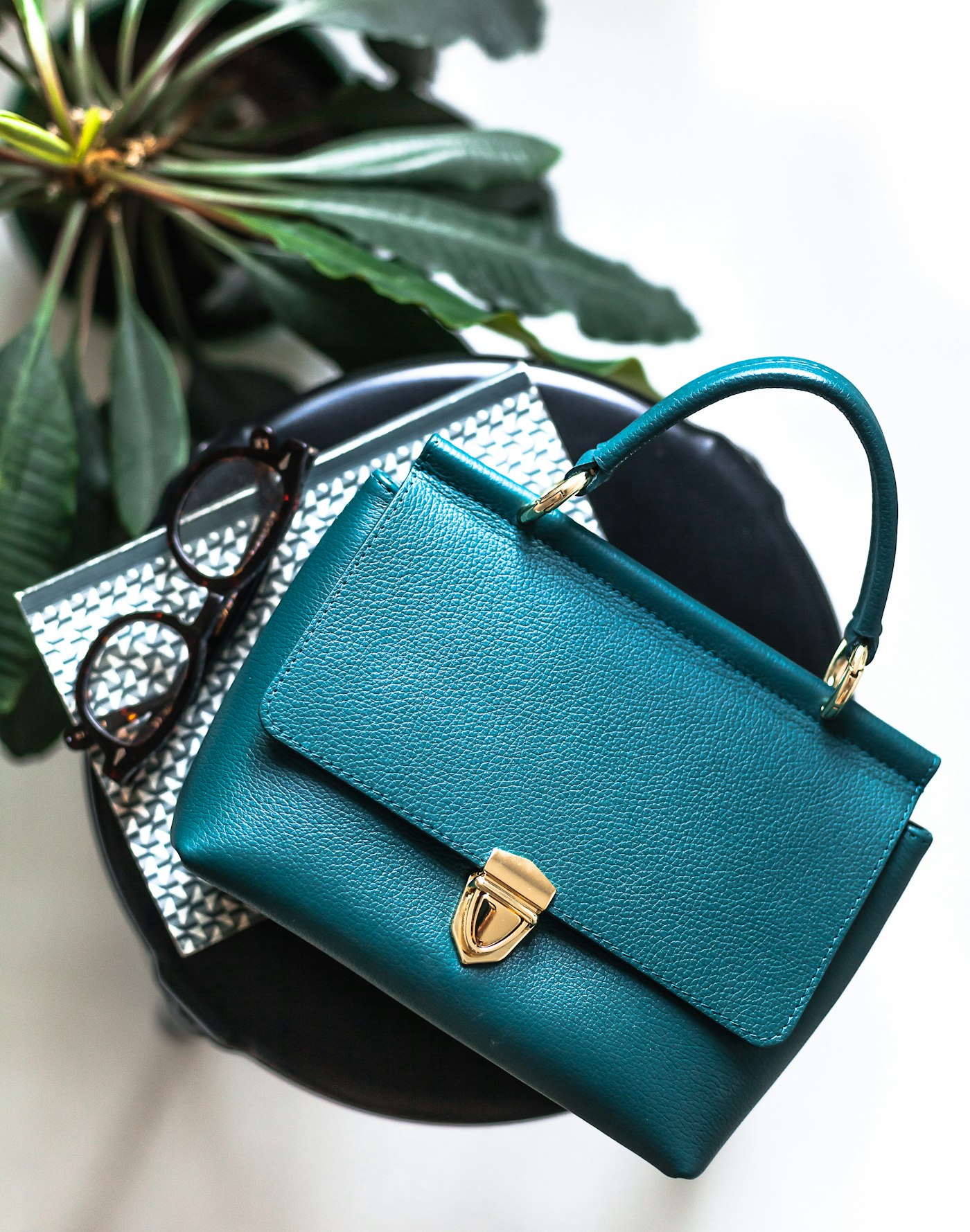 Teal leather handbag