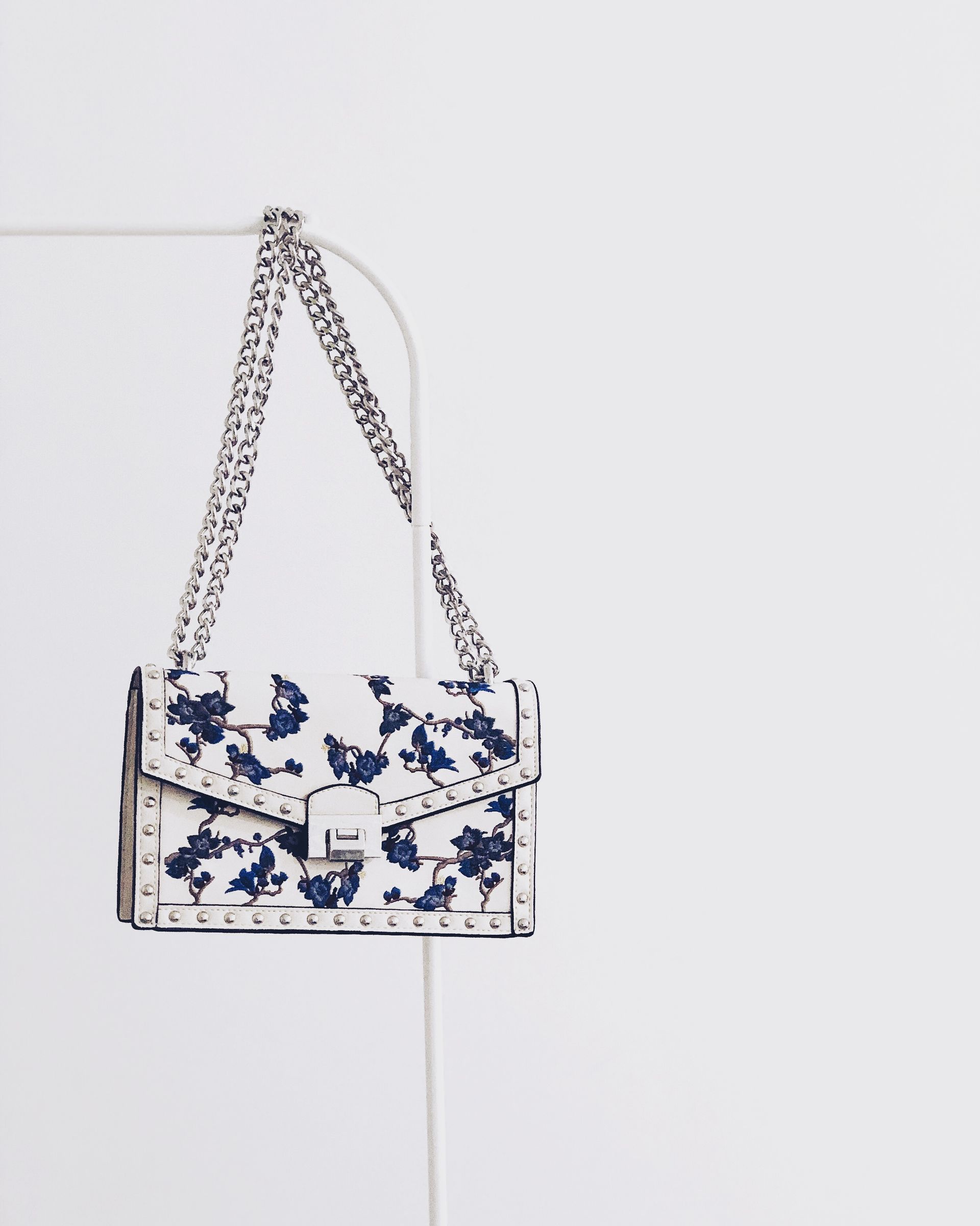 Ivory floral ladies clutch with chain strap